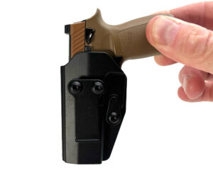 Product image: FingerholdingGoatGunsm17holster.jpg
